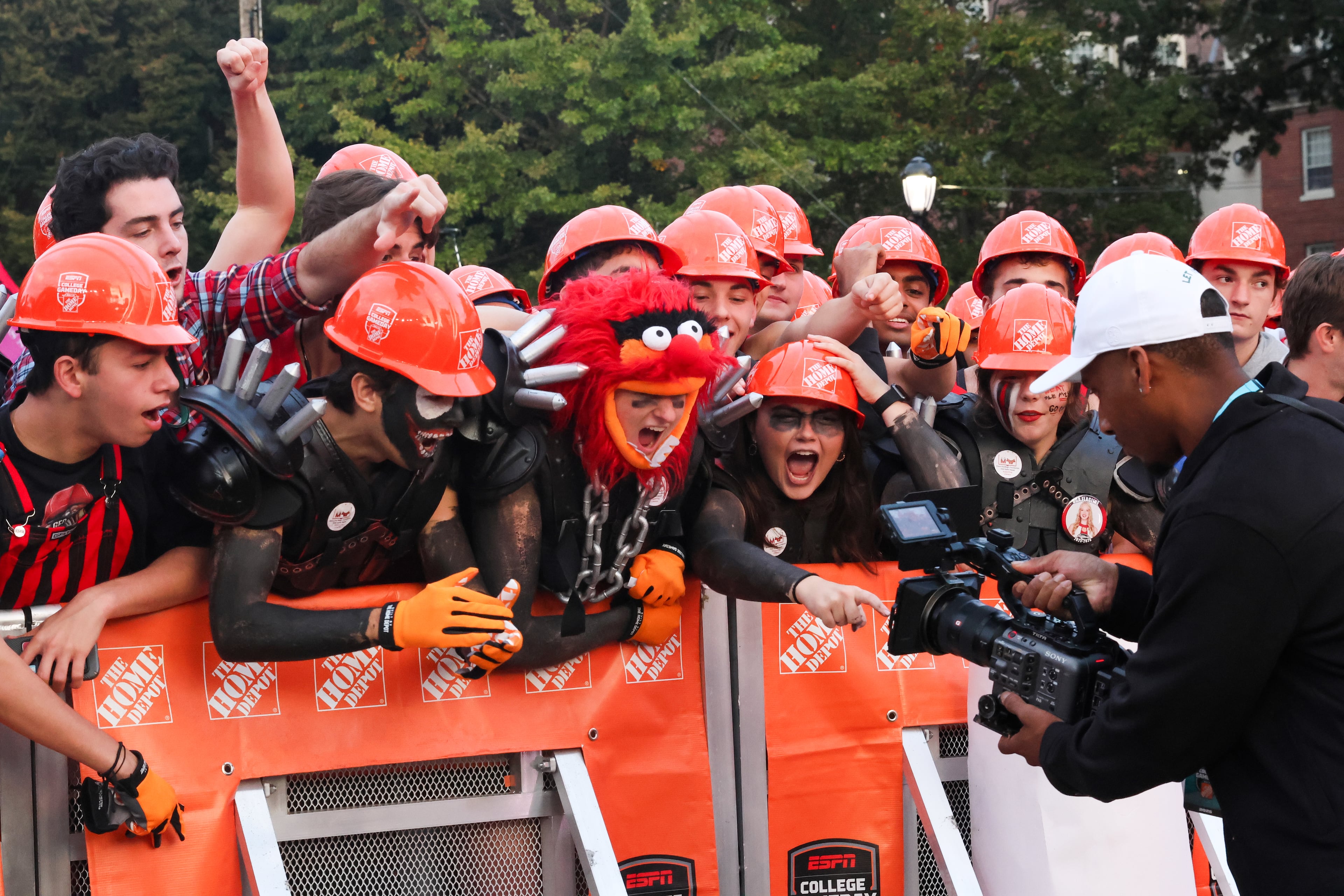 UGA fans yell into a camera before the ESPN College GameDay broadcast from Myers Quad at UGA on Saturday, Oct. 18, 2025. (C.J. Bartunek for the AJC)