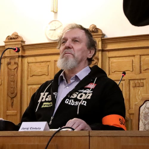 Juraj Cintula, who shot and seriously injured Prime minister of Slovakia Robert Fico last year,attends hearings at the Specialized Criminal Court in Banska Bystrica, Slovakia, Tuesday, Oct. 21, 2025. (Jan Kroslak/TASR via AP)