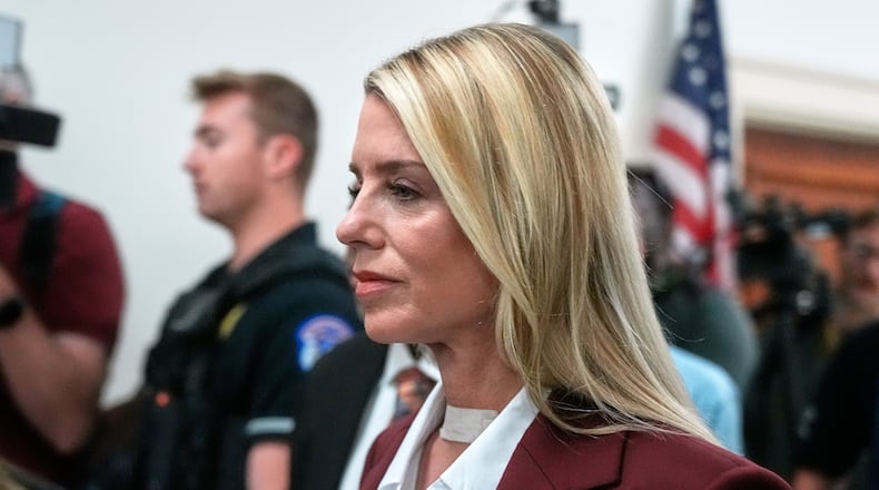 Former Attorney General Pam Bondi arrives for her deposition at the Rayburn House Office Building on Capitol Hill, Friday, May 29, 2026, in Washington. (AP Photo/Manuel Ceneta)