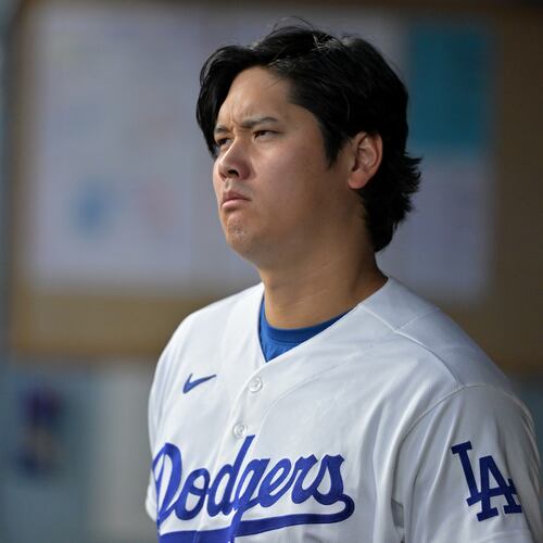 Los Angeles Dodgers' Shohei Ohtani looks on from the dugout during the first inning of a baseball game against the St. Louis Cardinals, Tuesday, Sept. 1, 2026, in Los Angeles. (AP Photo/Jayne Kamin-Oncea)
