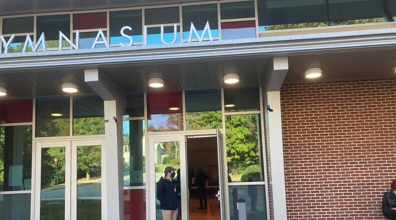 Voting equipment wasn’t working at Morris Brandon Elementary in Buckhead, forcing voters to use emergency paper ballots instead. (J.D. Capelouto/AJC)