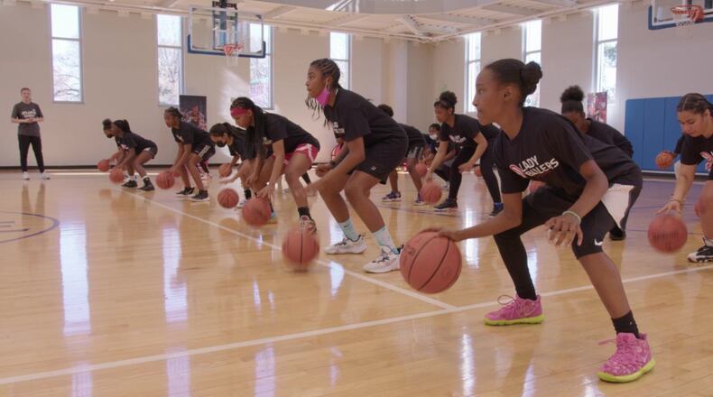 About 70 girls participated Saturday at a basketball clinic that featured Harlem Globetrotters player “Mighty” Mia Hopkins and was hosted by the Hawks Basketball Academy. (Atlanta Hawks)