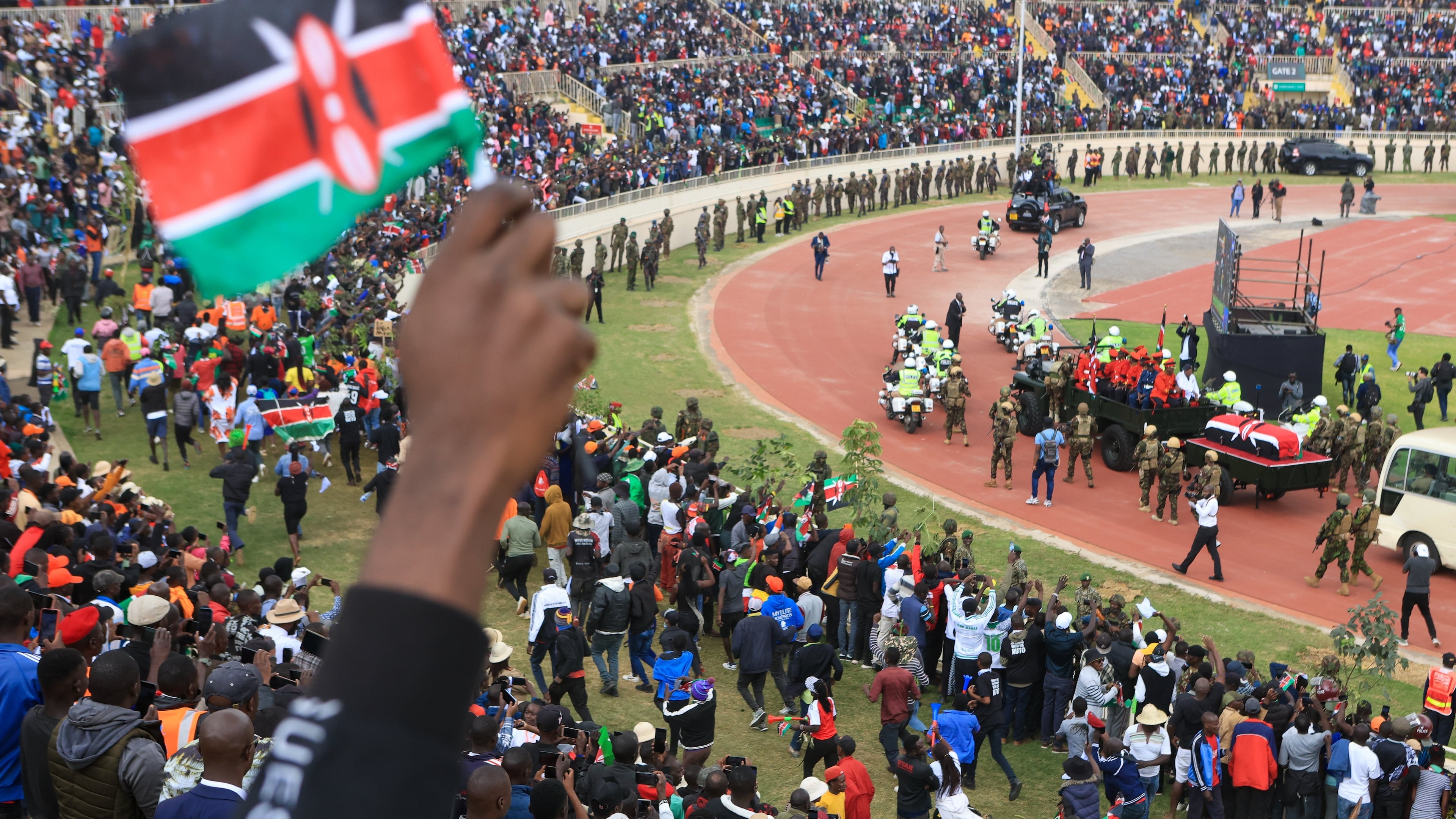 The coffin carrying the remains of former Kenya Prime Minister Raila Odinga arrives for his state funeral at Nyayo National Stadium in Nairobi, Kenya, Friday, Oct. 17, 2025. (AP Photo/Andrew Kasuku)