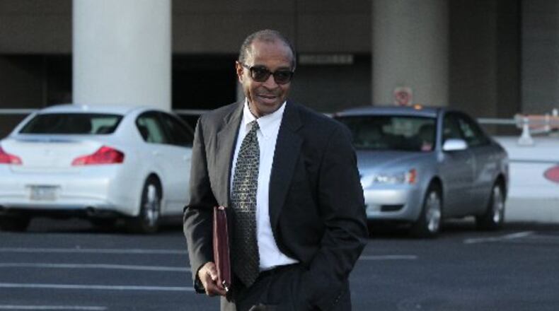 Elvin “E.R.” Mitchell Jr. leaving the federal courthouse in Atlanta after pleading guilty last month to a single count of conspiracy to commit bribery and launder money. Mitchell’s Cascade Building Systems was awarded a majority of the work from the city of Atlanta in response to the February 2014 winter storm at a time that federal prosecutors say he was paying bribes in exchange for contracts. HENRY TAYLOR / HENRY.TAYLOR@AJC.COM