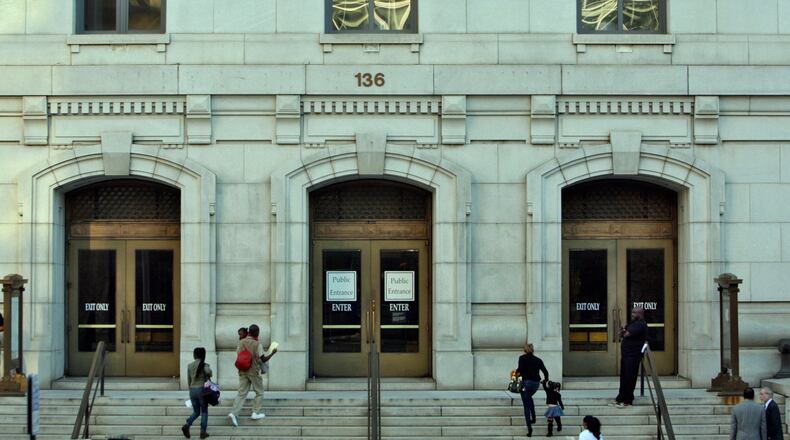 The entrance to the Fulton County Courthouse on the Pryor Street side. The building, now covered in scaffolding, will undergo renovations. BOB ANDRES / BANDRES@AJC.COM (AJC FILE PHOTO)