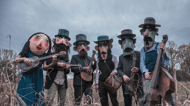 Del Roscoe founder Robert Lee refers to the band, based in Avondale Estates, as "a sort of outsider art theater troupe — who also just happen to make records and play live shows.” When the band has room onstage, the musicians enjoy utilizing props and oversized masks made by drummer Matt McKinney. (Courtesy of Jeff Shipman)