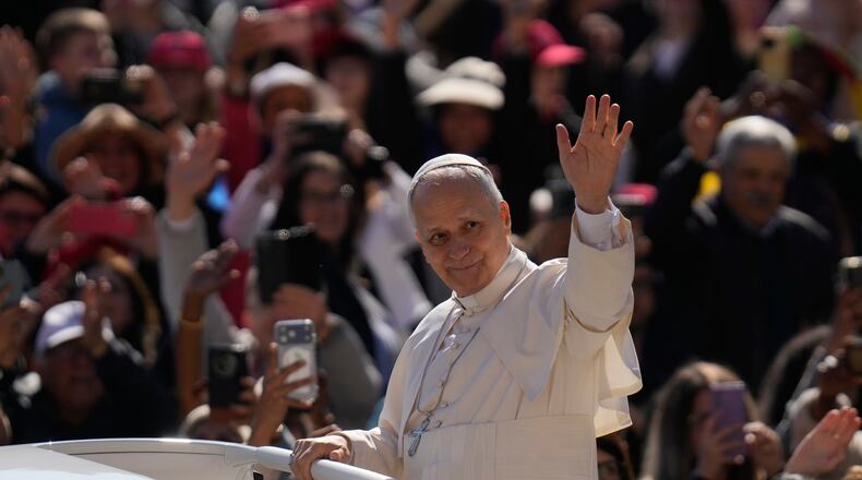 Pope Leo XIV arrives for his weekly general audience in St. Peter's Square, at the Vatican, Wednesday, April 8, 2026. (AP Photo/Gregorio Borgia)