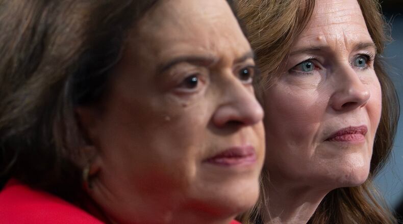 Supreme Court Justices Amy Coney Barrett, right, and Elena Kagan testify during a House Appropriations subcommittee hearing, Tuesday, July 14, 2026, on Capitol Hill in Washington. (AP Photo/Nathan Howard)