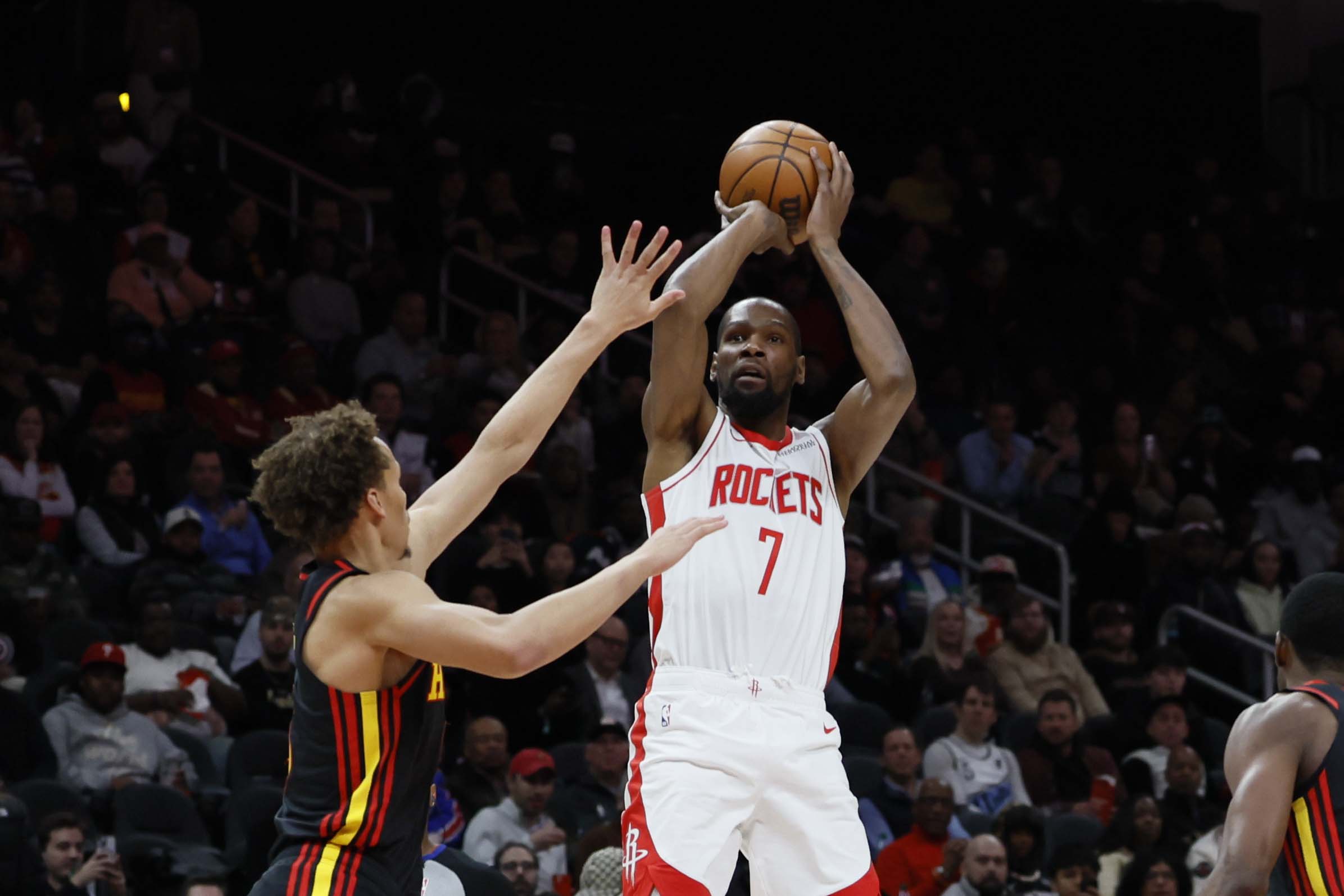 Houston Rockets forward Kevin Durant goes up for a basket against Atlanta Hawks guard Dyson Daniels during the first half of an NBA basketball game, Thursday, Jan. 29, 2026, in Atlanta. (Miguel Martinez/AJC)