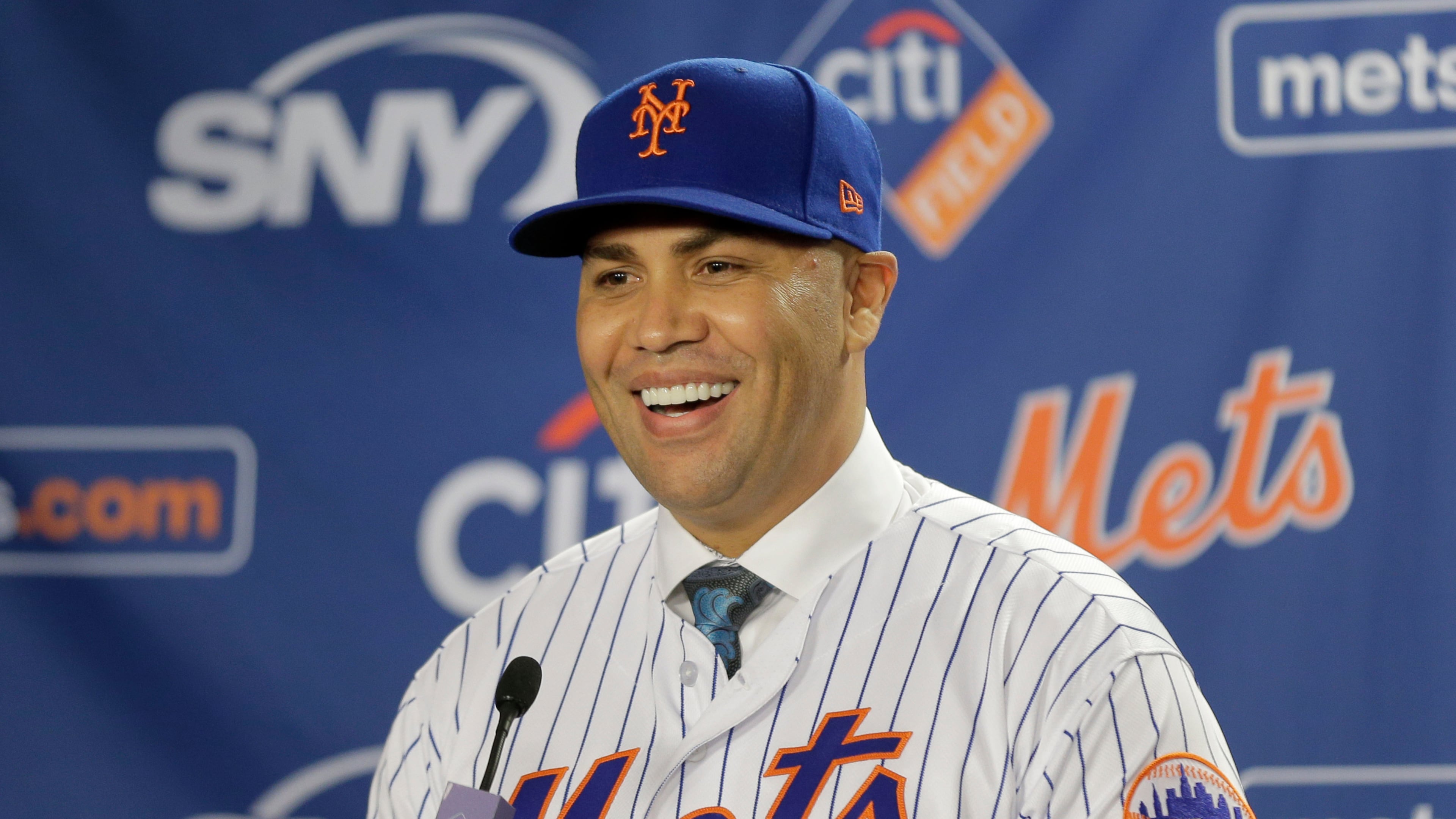 FILE - New York Mets' Carlos Beltran smiles during an introductory baseball news conference in New York, Nov. 4, 2019. (AP Photo/Seth Wenig, File)