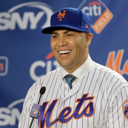 FILE - New York Mets' Carlos Beltran smiles during an introductory baseball news conference in New York, Nov. 4, 2019. (AP Photo/Seth Wenig, File)
