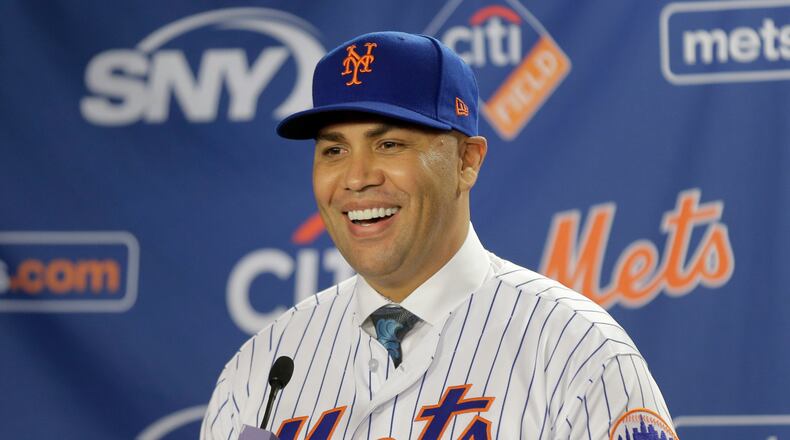 FILE - New York Mets' Carlos Beltran smiles during an introductory baseball news conference in New York, Nov. 4, 2019. (AP Photo/Seth Wenig, File)