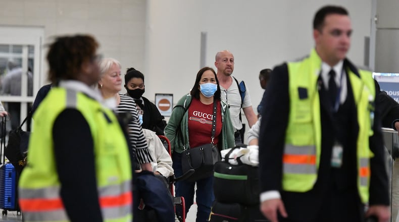 International travelers arrive at the Atlanta airport’s Maynard H. Jackson Jr. International Terminal on Tuesday, March 3, 2020. (Hyosub Shin / Hyosub.Shin@ajc.com)