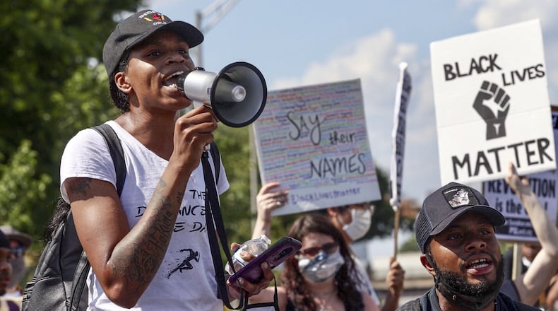 June 13, 2020 - Atlanta - Protestors gather on University Ave near the Atlanta Wendy’s where Rayshard Brooks, a 27-year-old Black man, was shot and killed by Atlanta police Friday evening during a struggle in a Wendy’s drive-thru line. Steve Schaefer for the Atlanta Journal Constitution