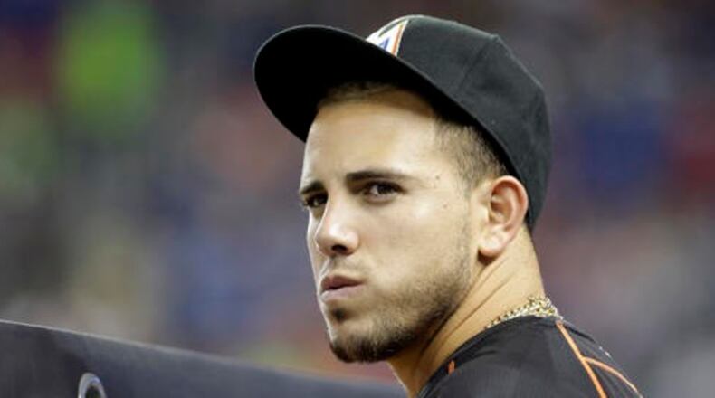 In this June 23, 2015, file photo, Miami Marlins pitcher Jose Fernandez stands in the dugout before the start of a baseball game against the St. Louis Cardinals in Miami. The families of the two men who were with Fernandez when his boat crashed into a Miami Beach jetty, killing all three , are suing the All-Star's estate.
Attorney Christopher Royer, who is representing the families of 25-year-old Eduardo Rivero and 27-year-old Emilio Jesus Macias, told the Sun Sentinel that Rivero's claim was filed Friday, Feb. 10, 2017 and Macias' will be filed Monday. Each family is seeking $2 million. (AP Photo/Wilfredo Lee, File)