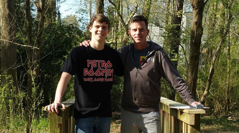 Eagle Scout Spencer Tomlinson and Randy Rossa, president of the Friends of the Park groups for Fisher Trail and Pendergrast parks