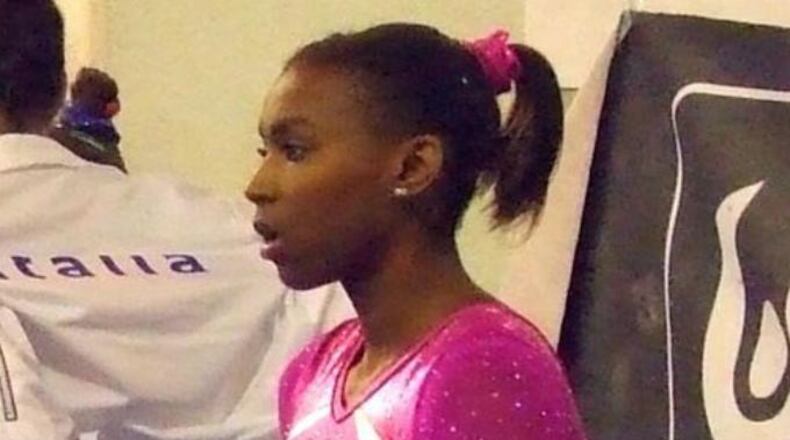 Nia Dennis (pictured in 2014) has gone viral for her floor routine at UCLA's dual meet against Utah on Sunday, set to Beyonce's music.
