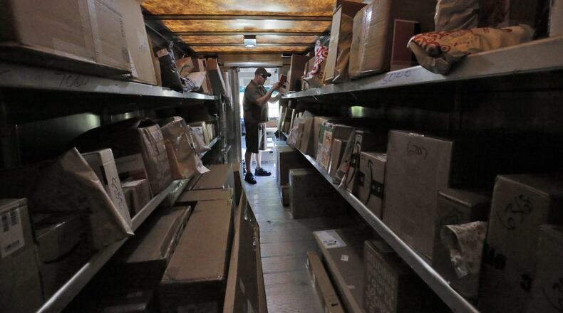 Delivery giant UPS is among the many Georgia-based employers contemplating how the coronavirus outbreak might affect their workplaces in the United States. BOB ANDRES /BANDRES@AJC.COM