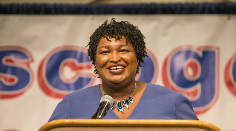 Stacey Abrams, the Democratic nominee for governor of Georgia, speaking to the Muscogee County Democratic Committee in Columbus. A published romance novelist, Abrams says storytelling is central to her campaign. “Storytelling is absolutely a necessary part of how you do politics because people need to understand that you get their story and that you can explain complicated ideas to them in ways that resonate, especially if it is not their own story.”(ALYSSA POINTER/ALYSSA.POINTER@AJC.COM)