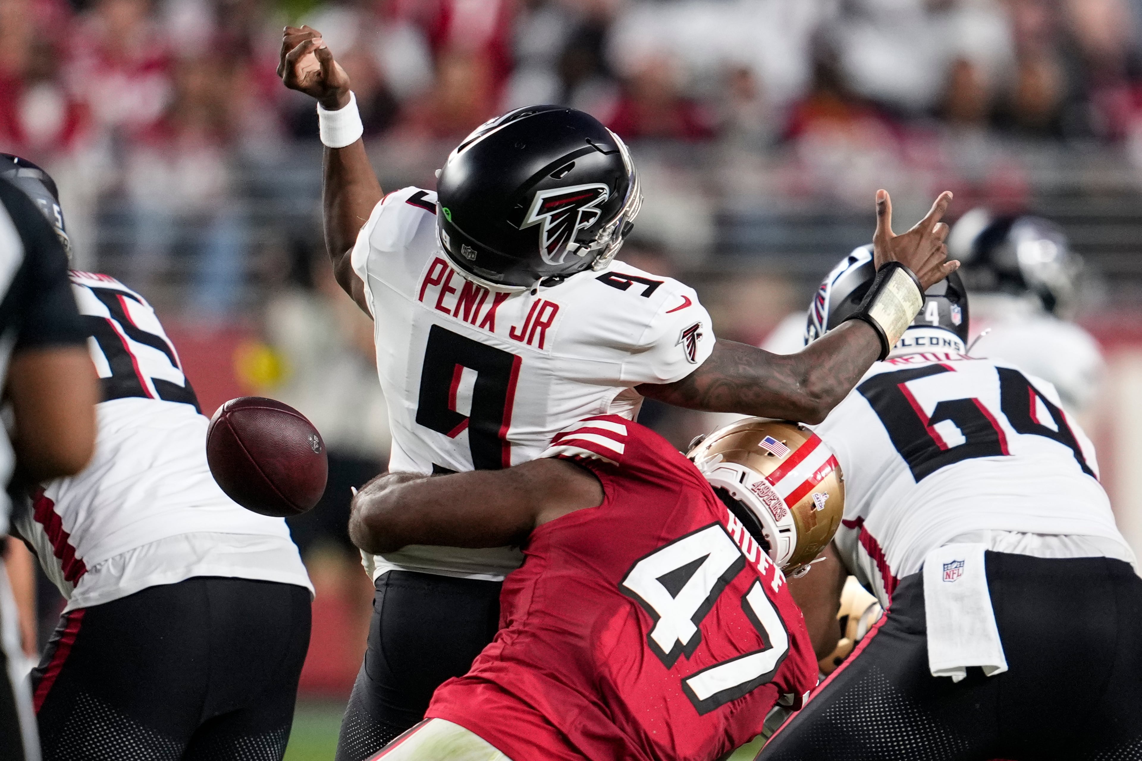 San Francisco 49ers defensive end Bryce Huff forces a fumble against Atlanta Falcons quarterback Michael Penix Jr. (center) during the first half on Sunday, Oct. 19, 2025, in Santa Clara, Calif. (Godofredo A. Vásquez/AP)