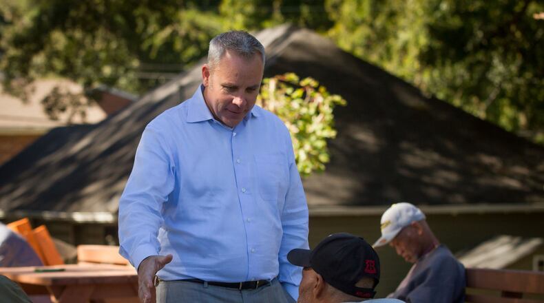 Tyler Bowser, an Air Force veteran, talks with residents at the Veterans Empowerment Organization facility in Atlanta. The VEO helps homeless veterans get off the street and back into a functioning civilian life. STEVE SCHAEFER / SPECIAL TO THE AJC