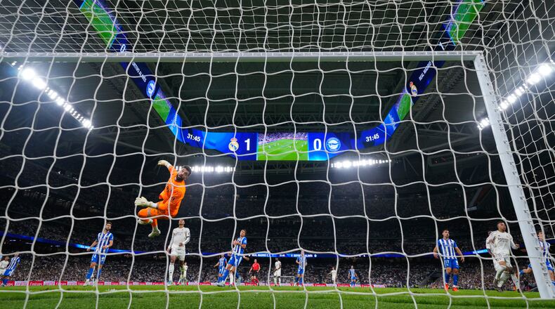 Alaves' goalkeeper Antonio Siverawatches ball go out of bounds during a La Liga soccer match between Real Madrid and Alaves in Madrid, Spain, Tuesday, April 21, 2026. (AP Photo/Manu Fernandez)