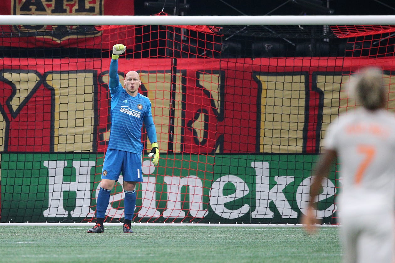 Atlanta United goalkeeper Brad Guzan announced his retirement on Tuesday. A team captain since 2019, Guzan has a franchise-high 303 appearances and 645 saves. (Curtis Compton/AJC)