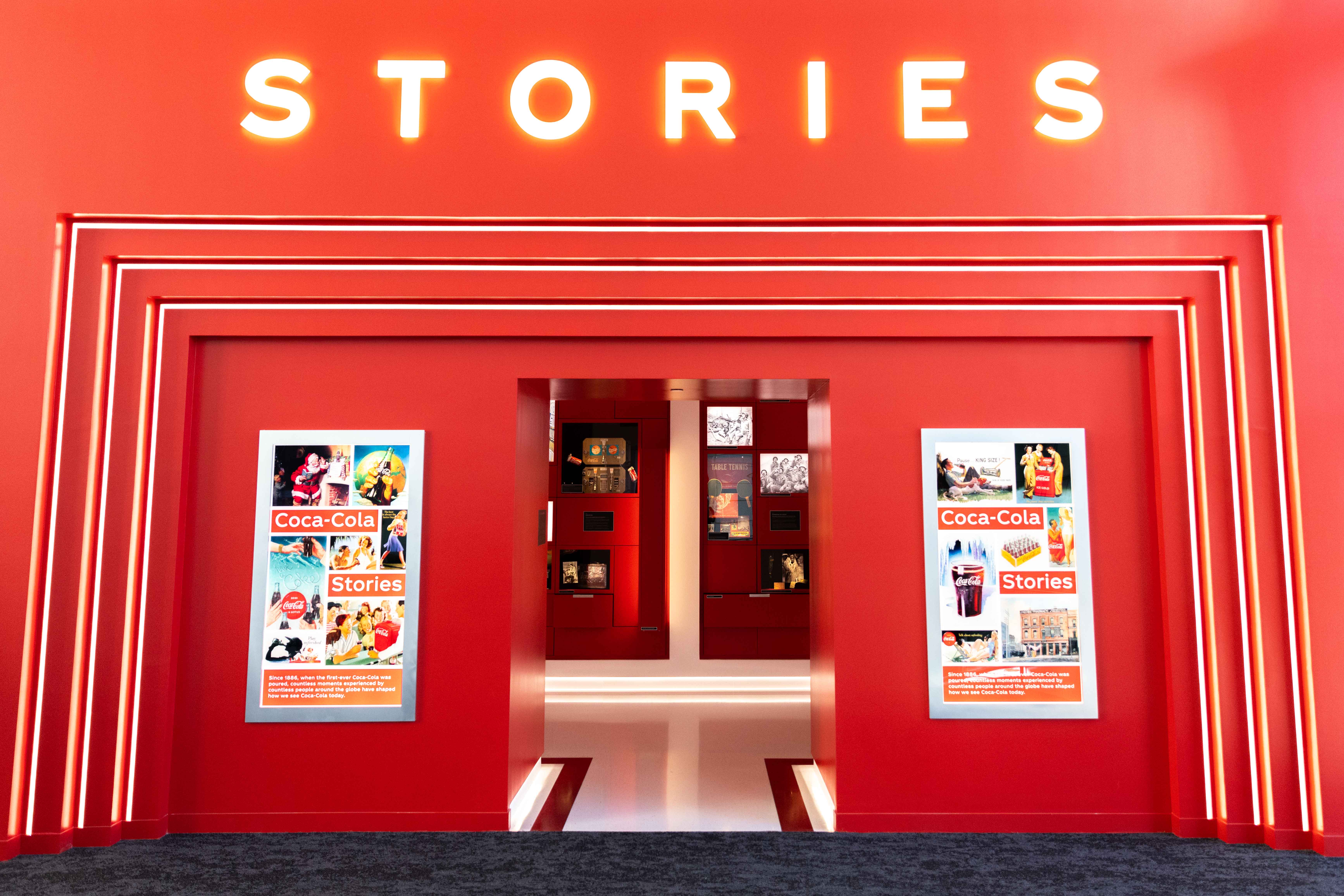 The entryway to "Coca-Cola Stories," a new exhibit opening at World of Coca-Cola on April 11. The tech-savvy exhibit incorporates items from the brand's archives to depict Coca-Cola's place in historical moments. Courtesy of World of Coca-Cola