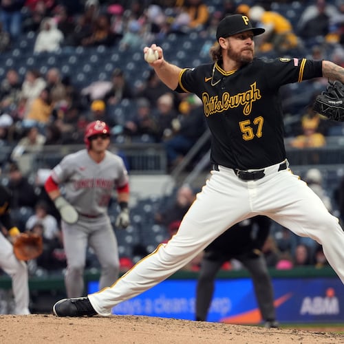 FILE - Pittsburgh Pirates pitcher Chris Devenski deliver a pitch against the Cincinnati Reds in the sixth inning of a baseball game in Pittsburgh, Saturday, May 2, 2026. (AP Photo/Tom E. Puskar, File)