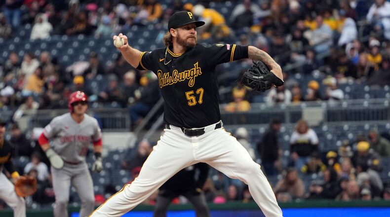 FILE - Pittsburgh Pirates pitcher Chris Devenski deliver a pitch against the Cincinnati Reds in the sixth inning of a baseball game in Pittsburgh, Saturday, May 2, 2026. (AP Photo/Tom E. Puskar, File)