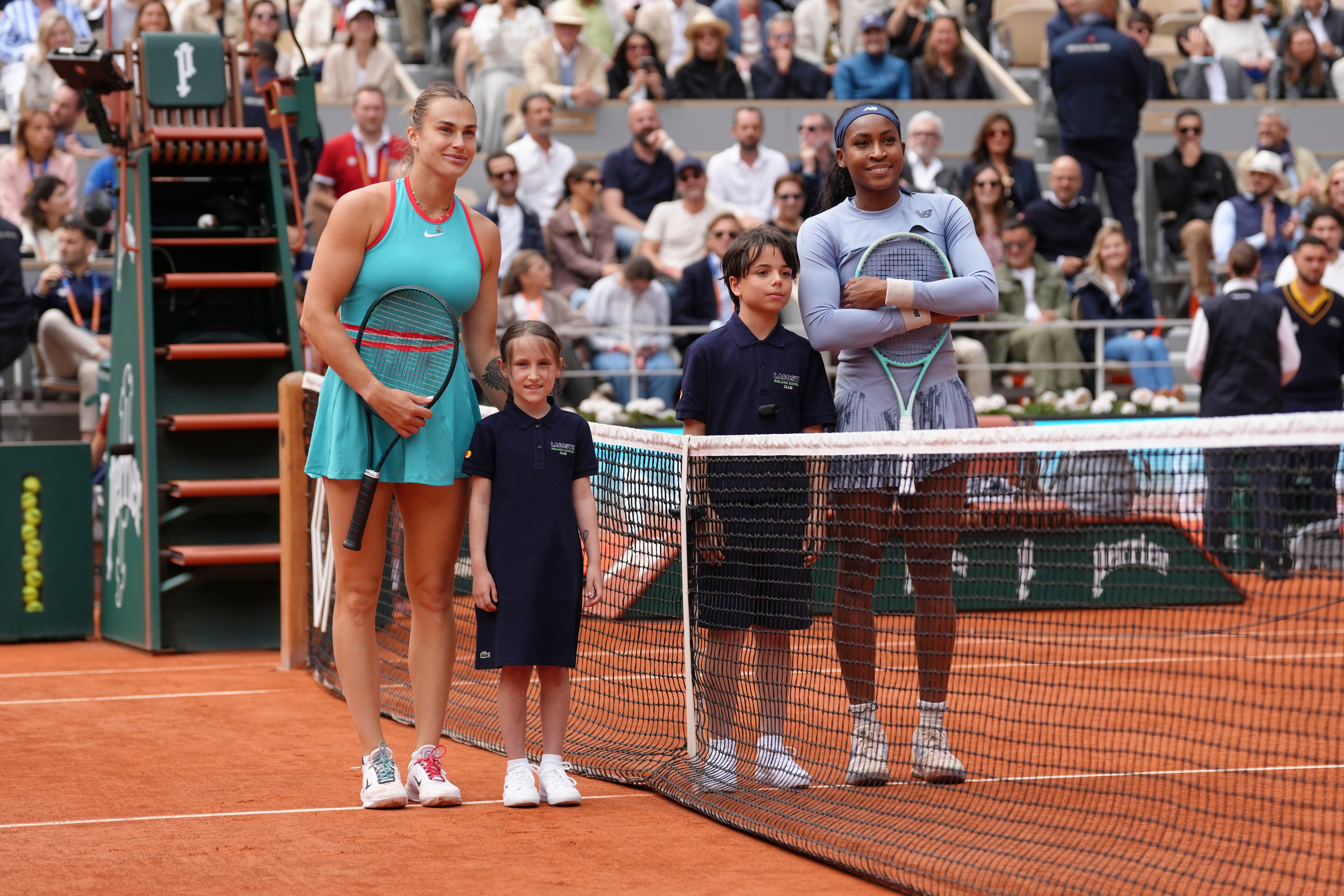 Aryna Sabalenka of Belarus, left, and Coco Gauff of the U.S. pose for a picture before their final match of the French Tennis Open at the Roland-Garros stadium in Paris, Saturday, June 7, 2025. (AP Photo/Aurelien Morissard)