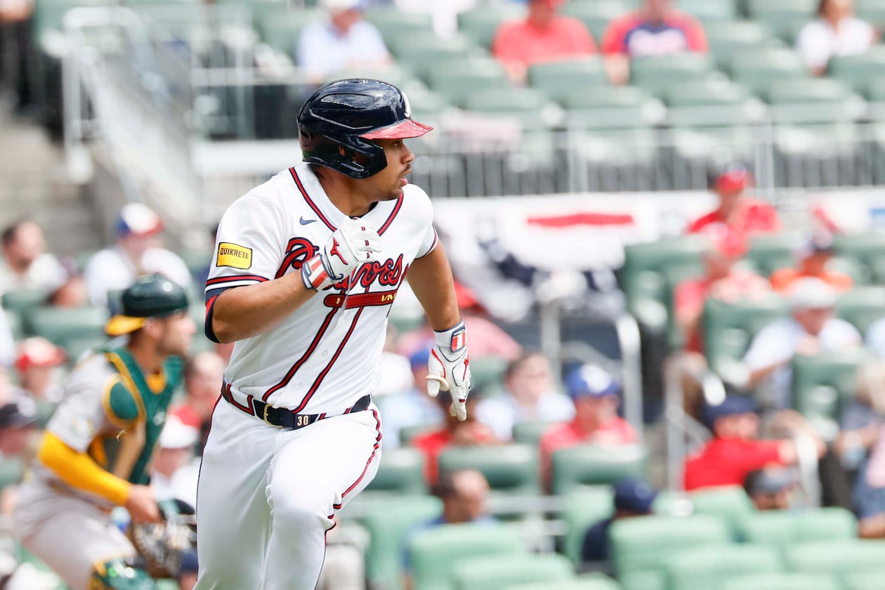 Atlanta Braves’ catcher Drake Baldwin watches the ball after hitting a two-RBI single during the second inning against the Athletics at Truist Park on Wednesday, April 1, 2026. (Miguel Martinez/AJC)