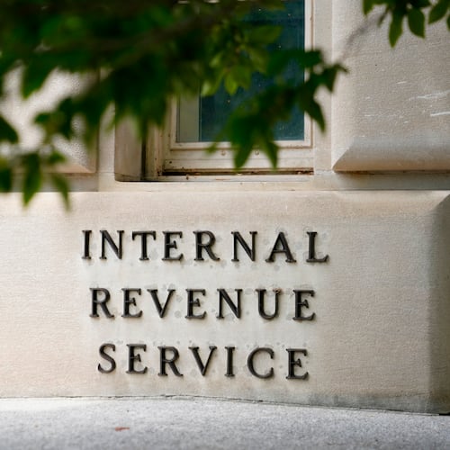 FILE - A sign outside the Internal Revenue Service building is photographed May 4, 2021, in Washington. (AP Photo/Patrick Semansky, File)