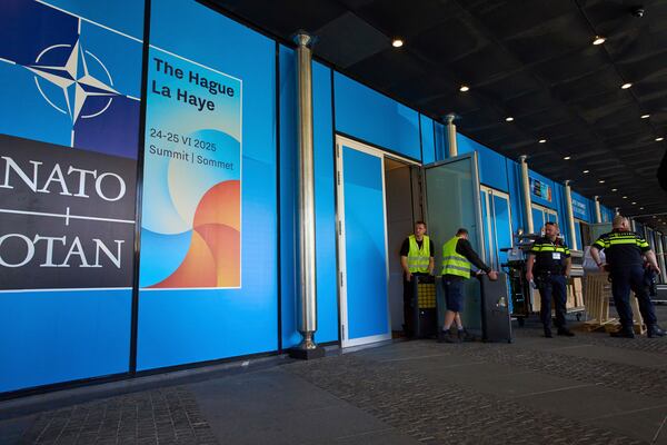 Dutch police guard an entrance to the summit site ahead of the NATO summit in The Hague, Netherlands, Wednesday, June 18, 2025. (AP Photo/Peter Dejong)