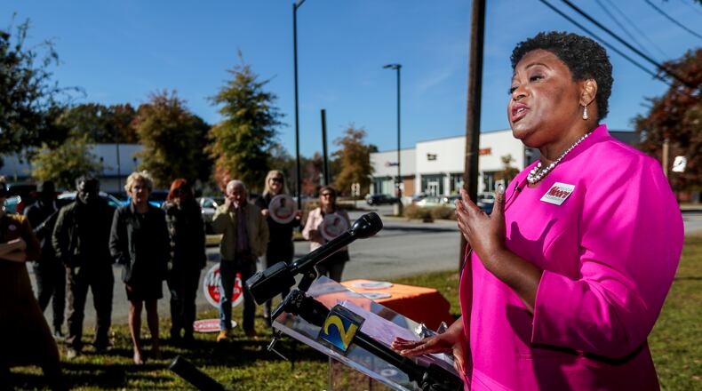 November 15, 2021 Atlanta:  Atlanta City Council President Felicia Moore laid out in detail her vison for Atlanta on Monday, Nov. 15, 2021 at 2600 Bolton Road in Atlanta in what she described as a former “Food Desert” referring to the Publix and adjoining stores nearby that she helped get going. Moore surrounded by over a dozen supporters laid out her vision as she is headed to an Atlanta mayoral runoff election with Councilman Andre Dickens. (John Spink / John.Spink@ajc.com)