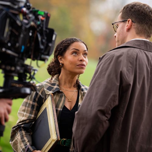 Antonia Thomas, left, and and Josh Dylan appear on the set of the Agatha Christie series "Tommy & Tuppence" in Beaconsfield, England on Wednesday, Oct. 29, 2025. (Photo by Scott A Garfitt/Invision/AP)