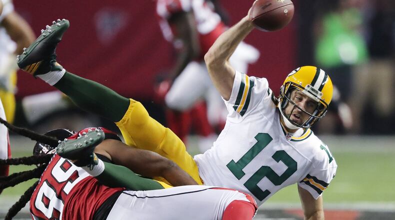 Falcons defensive end Adrian Clayborn sacks Packers quarterback Aaron Rodgers on  Sunday, Oct. 30, 2016, in Atlanta.