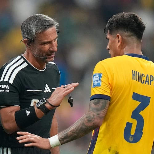 Referee Slavko Vincic, of Slovenia, talks to Ecuador's Piero Hincapie (3) during the World Cup round of 32 soccer match between Mexico and Ecuador in Mexico City, Tuesday, June 30, 2026. (AP Photo/Fernando Llano)