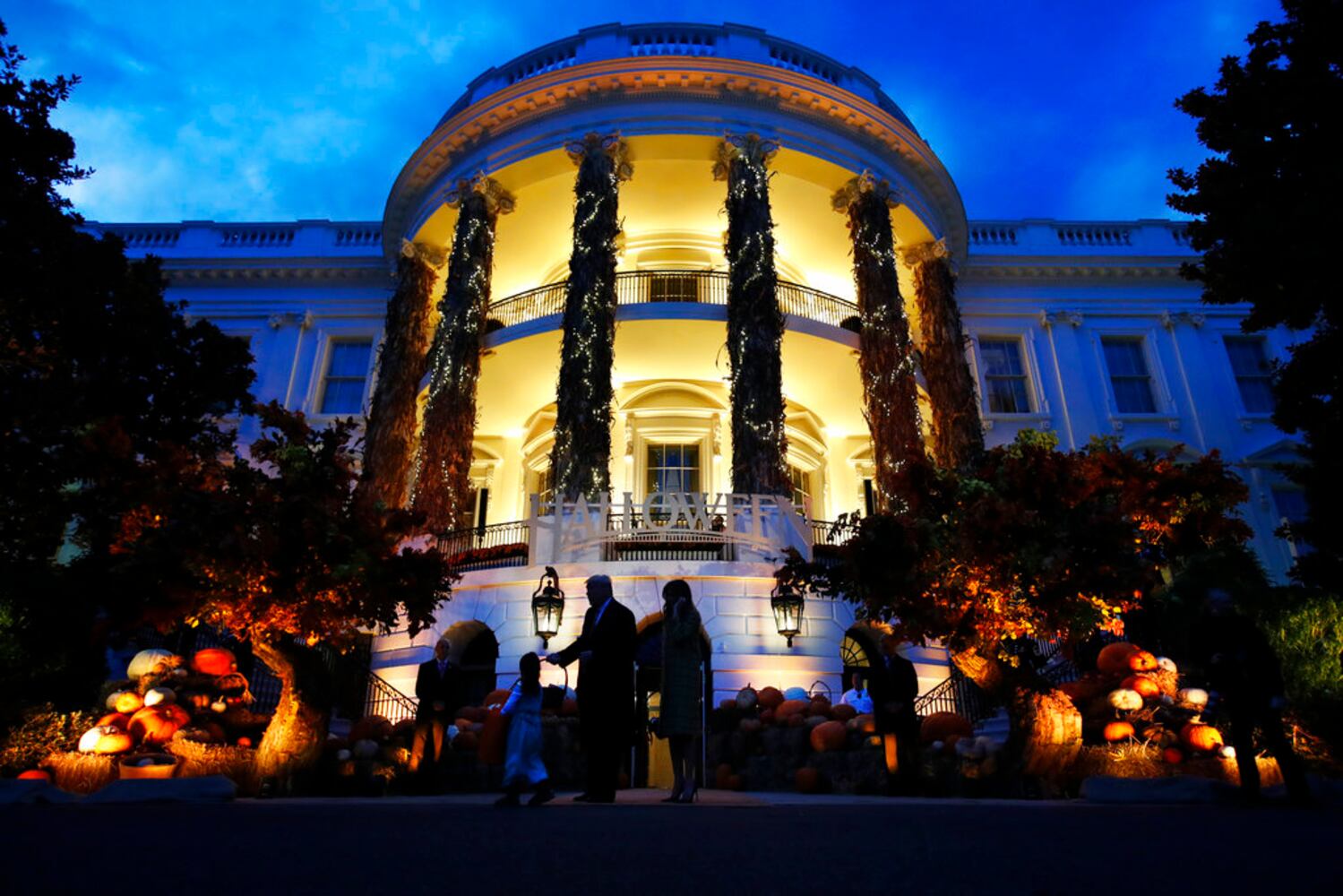 Photos: President Trump, first lady Melania Trump welcome children to White House for Halloween