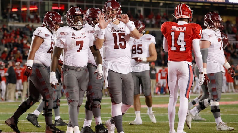 Anthony Russo (15) of the Temple Owls celebrates with Ryquell Armstead (7) after his sixth touchdown against the Houston Cougars at TDECU Stadium on Nov. 10, 2018 in Houston.  (Photo by Tim Warner/Getty Images)