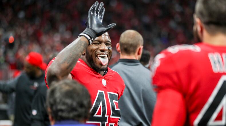 Atlanta Falcons middle linebacker Deion Jones (45) celebrates after incepting the ball late in the fourth quarter against the New Orleans Saints Thursday, Dec. 7, 2017, at Mercedes-Benz Stadium in Atlanta.