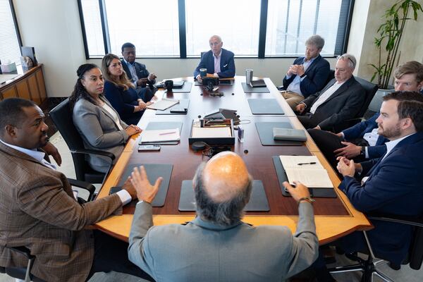 Dentons’ government affairs group in Atlanta includes two of Georgia's former attorneys general. (Arvin Temkar/AJC)