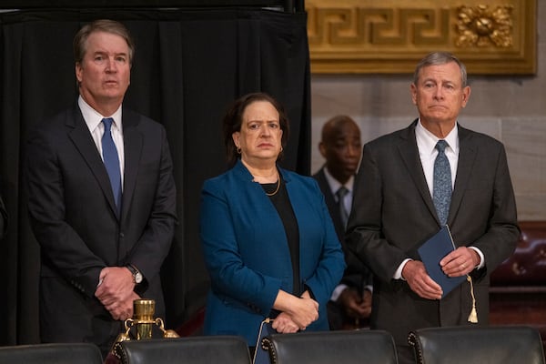 Supreme Court Associate Justice Brett Kavanaugh, Associate Justice Elana Kagan, and Chief Justice John Roberts are seen ahead of former President Jimmy Carter lying in state inside the rotunda of the U.S. Capitol Building in Washington, D.C., on Tuesday, Jan. 7, 2025. (Nathan Posner for the AJC)