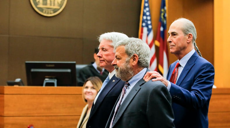 04/13/2018 -- Atlanta, GA - Defense attorney Bruce Harvey gives the jury an eye measure of Claud "Tex" McIver, left, and Don Samuel during the nineteenth day of trial for Tex McIver before Fulton County Chief Judge Robert McBurney, Friday, April 13, 2018. Attorney Bruce Harvey demonstrated the similar physical characteristics of the two men following a question on how accurate a crime scene analysis may have been using defense attorney Don Samuel in place of Tex McIver. ALYSSA POINTER/ALYSSA.POINTER@AJC.COM