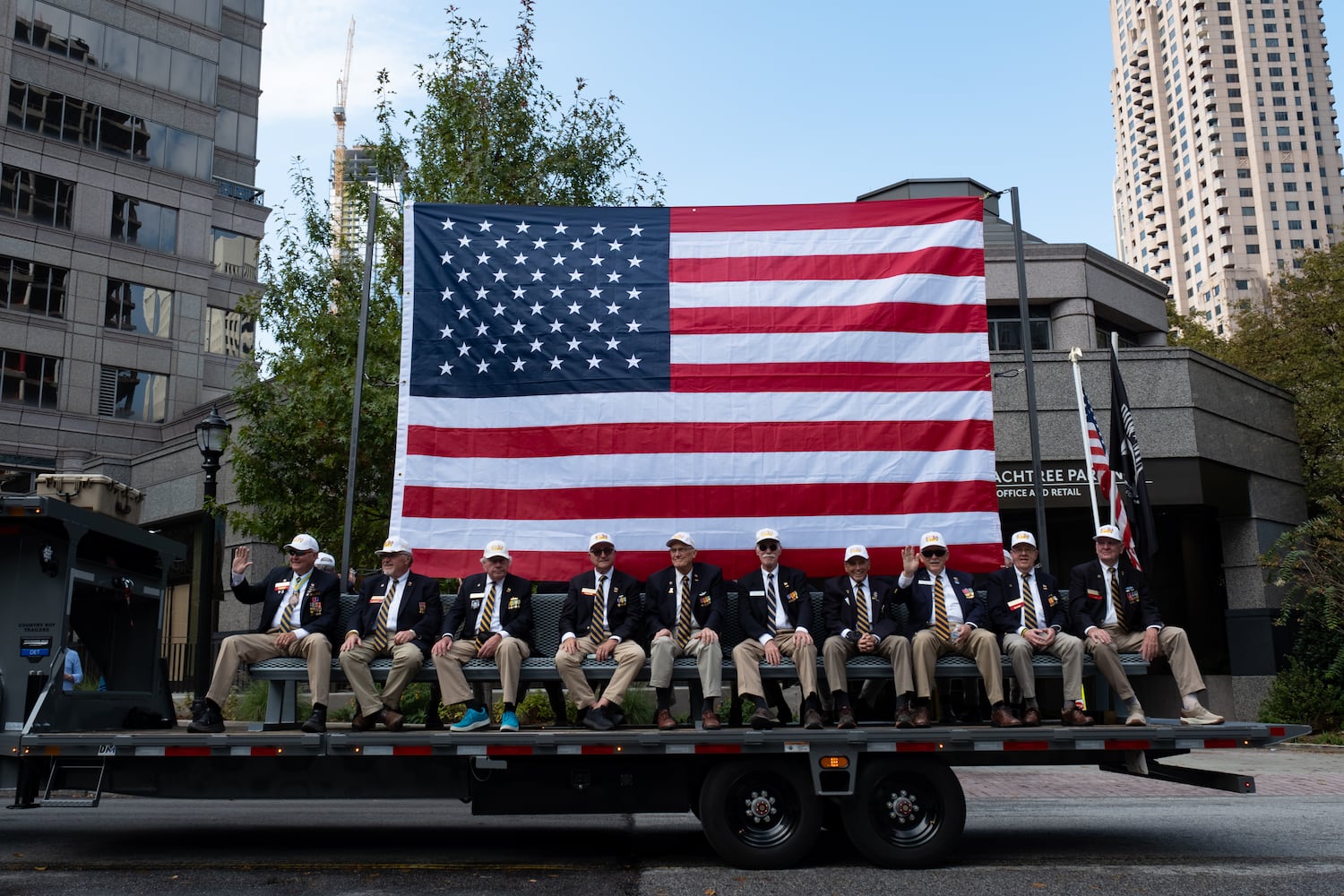 Members of the Atlanta Vietnam Veterans Business Association ride in the Georgia Veterans Day Parade in Midtown Atlanta on Saturday, Nov. 8, 2025.   Ben Gray for the Atlanta Journal-Constitution