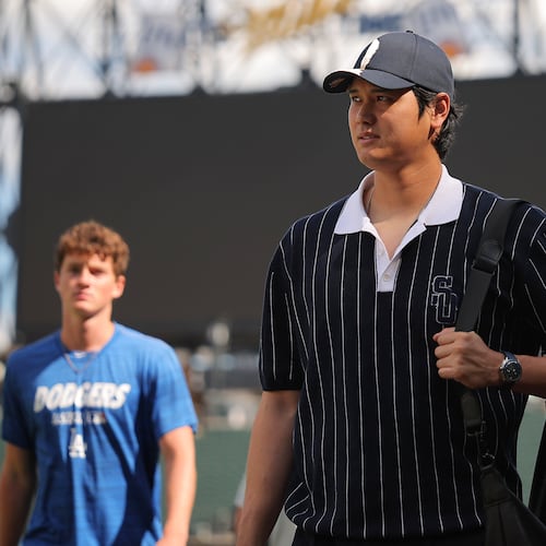 Los Angeles Dodgers' Shohei Ohtani enters the field prior to a baseball game against the Chicago White Sox, Friday, June 12, 2026, in Chicago. (AP Photo/Melissa Tamez)