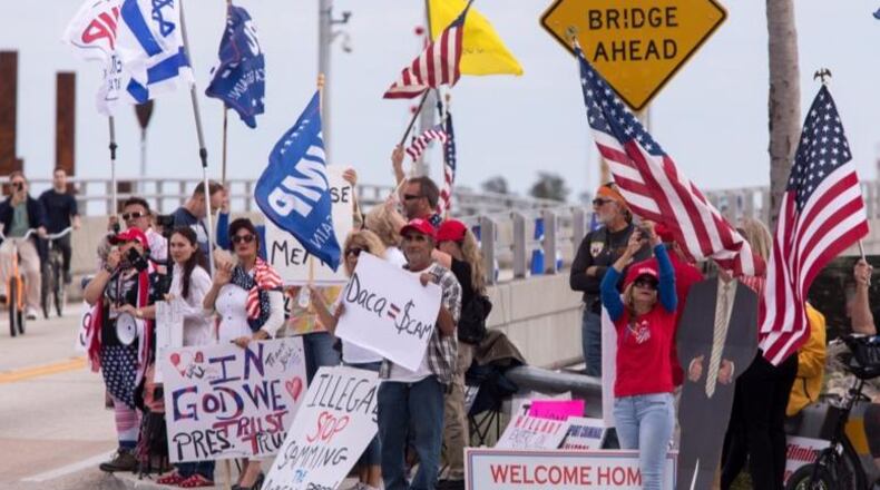 Despite President Donald Trump deciding not to travel to Palm Beach on Saturday, January 20, 2018 due to the government shutdown, supporters and protesters stood near Mar-a-Lago. (Photo: Palm Beach Post)