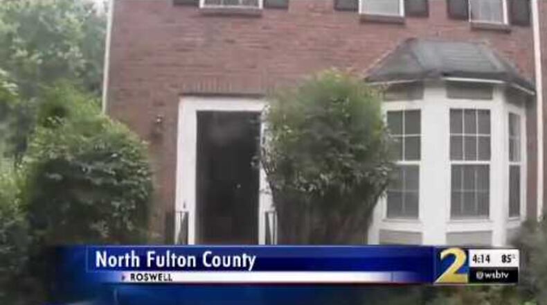 Police say that a man kicked in a woman's door in a possible attempted robbery last week in Roswell. Police only have a vague description of the suspect.