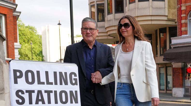 Britain's Prime Minister Keir Starmer and wife Victoria arrive at a polling station in central London, Thursday, May 7, 2026 to cast their votes in the local elections.(AP Photo/Kirsty Wigglesworth)
