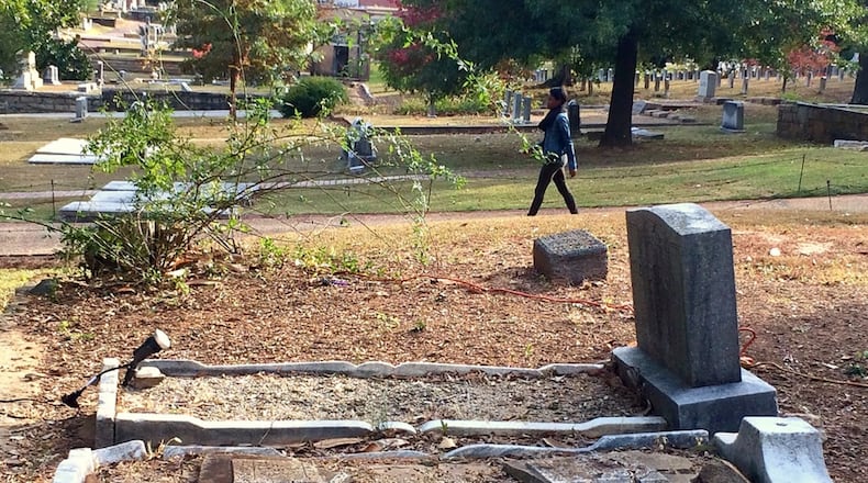 The gravestones of attorney Estelle Henderson and Dr. Beatrice Thompson at Oakland Cemetery are in need of repair. Visitors to this year’s Capture the Spirit of Oakland tour are asked to donate money for their refurbishment. The African-American sisters rose to prominence at a time when such accomplishments were rare for women of color. MARK DAVIS / MRDAVIS@AJC.COM